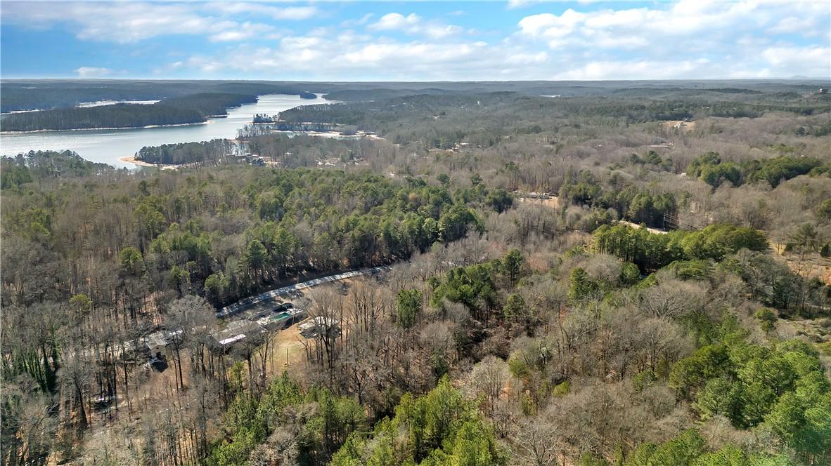 Image 4: This elevated view captures a serene landscape wit