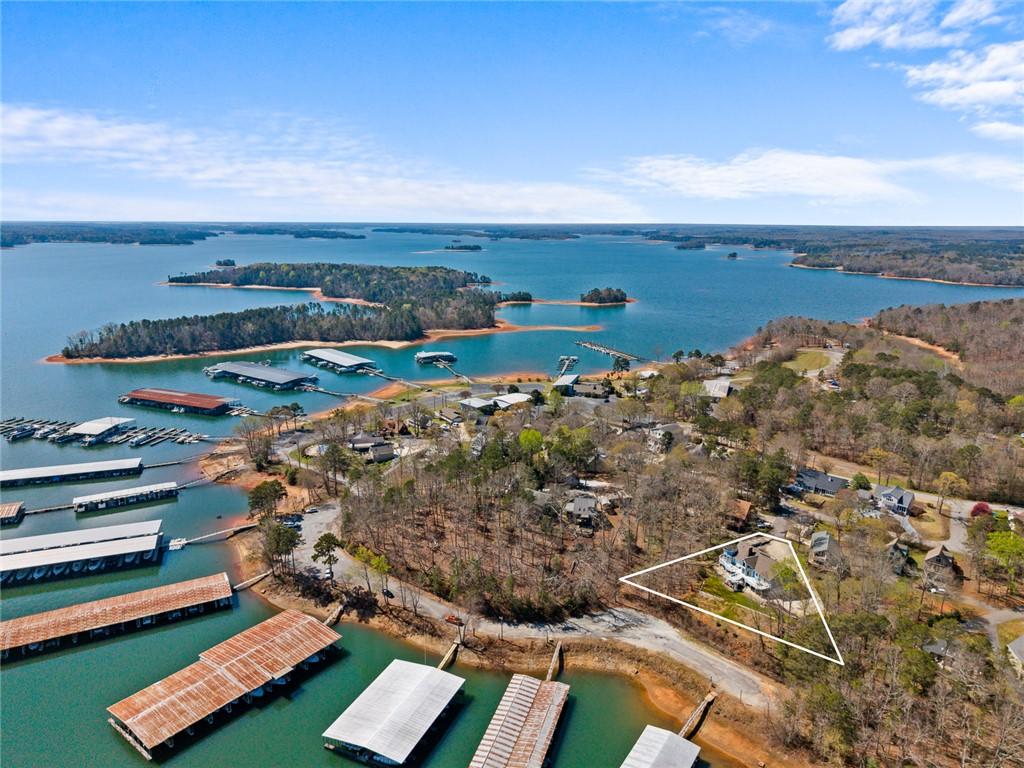 Image 3: This aerial view showcases a residence nestled amo