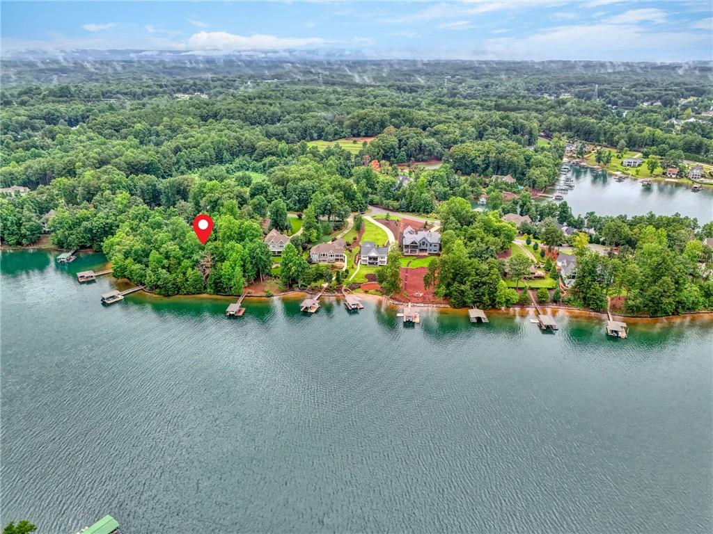Image 4: A tranquil lakefront property offers private docks