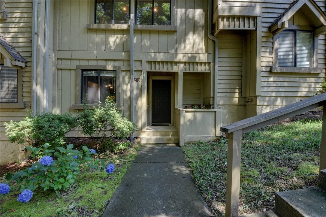 Image 2: A welcoming facade, blending natural elements with