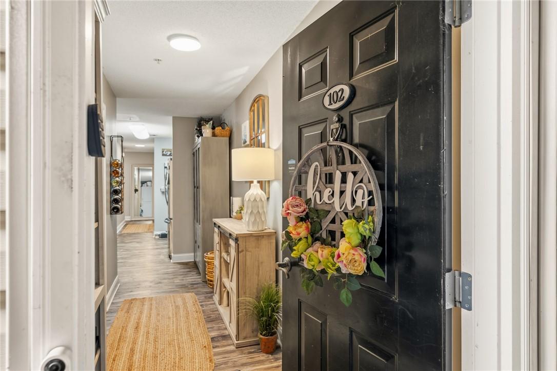 Image 2: Step into this welcoming entryway, featuring elega