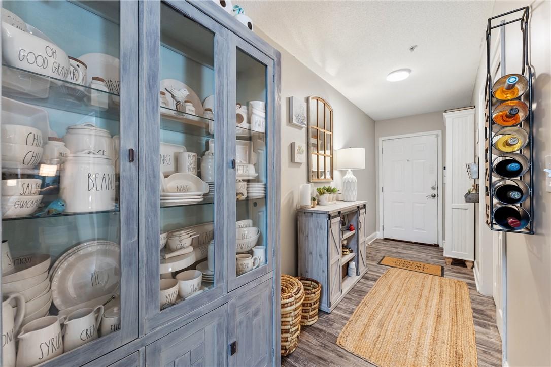 Image 3: The inviting entryway features charming details, s