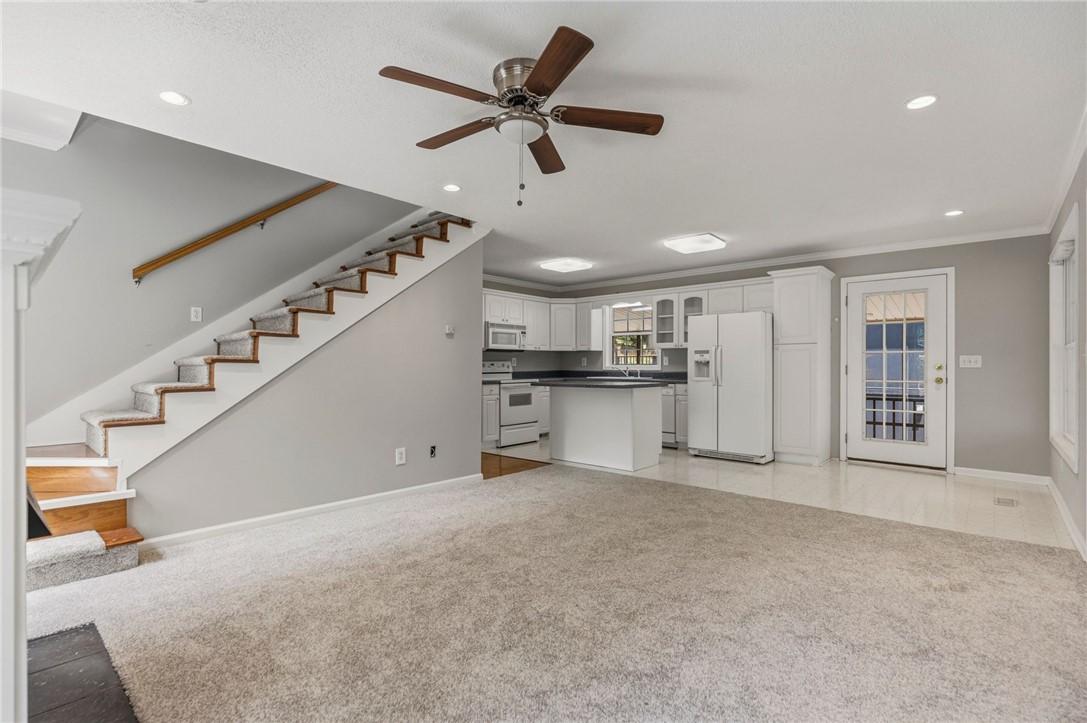 Image 4: This inviting space seamlessly blends living and c