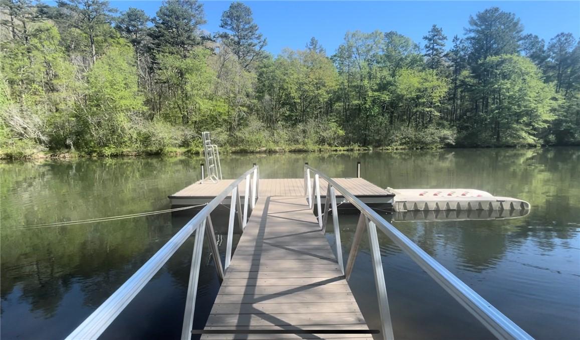 Image 3: This serene lakefront property offers direct water