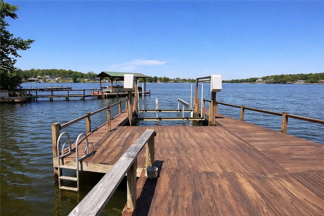 Image 3: This expansive lakefront dock provides direct acce