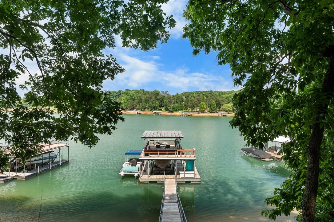 Image 3: Boasting direct water access, this property offers