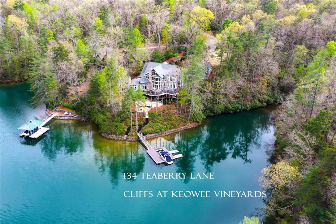 Image 2: This serene lakefront home offers picturesque view