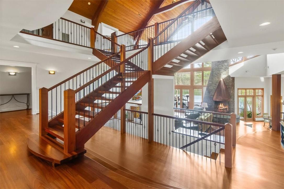 Image 4: This spacious interior features rich wood floors,