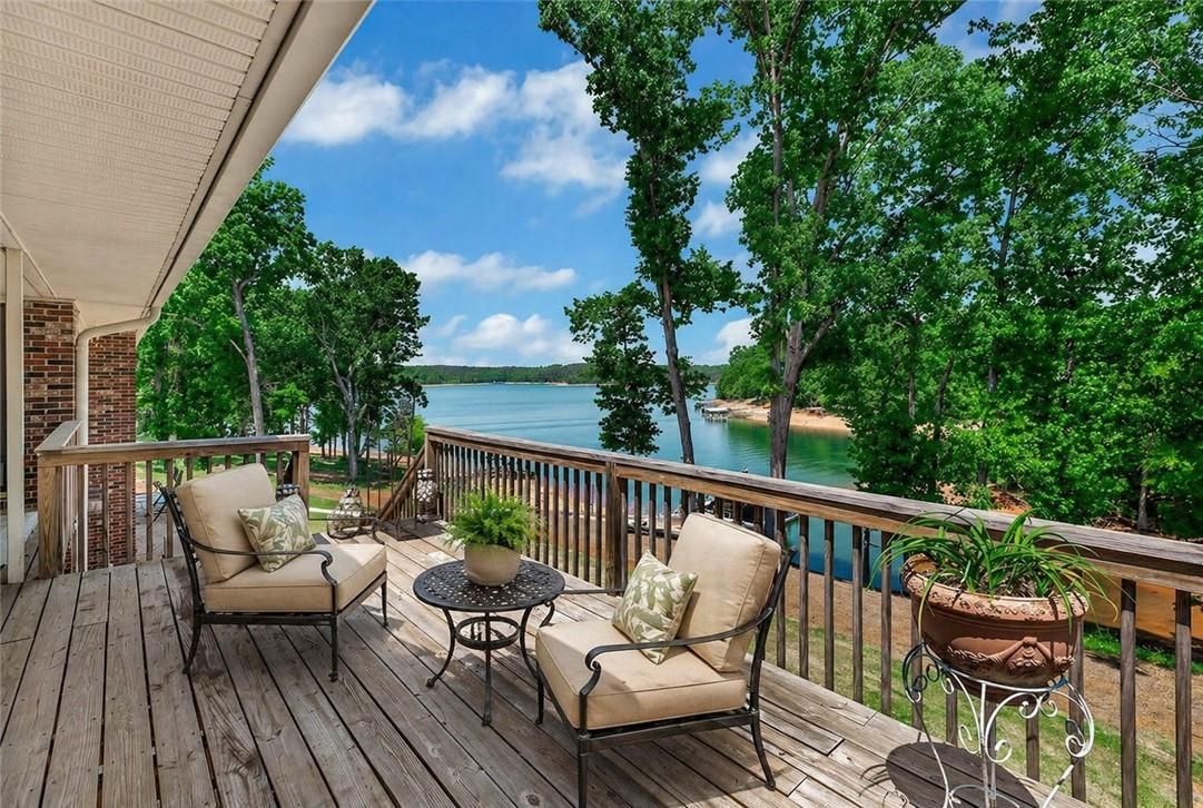 Image 4: Enjoy tranquil lake vistas from this expansive out
