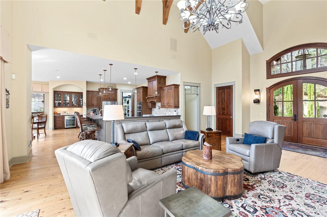 Image 3: Natural light floods this inviting living space, c