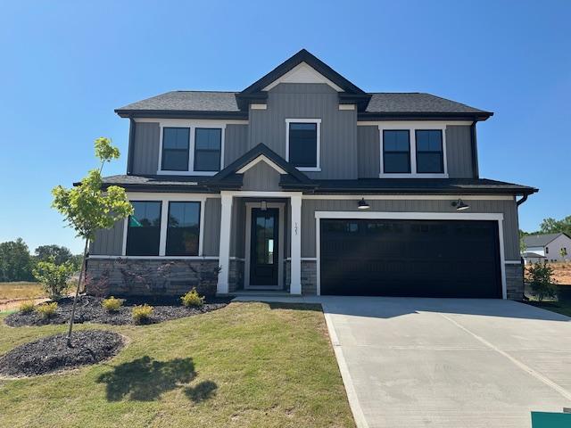 Image 2: This newly constructed home features a modern exte