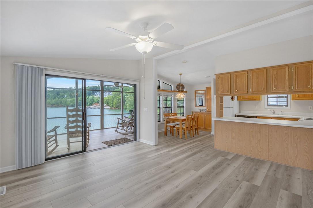 Image 3: The open floorplan seamlessly connects interior li