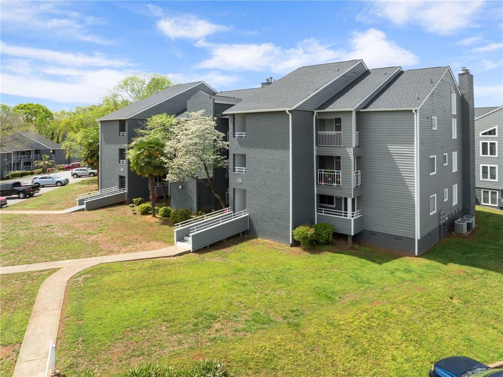 Image 2: This multi-story residential building offers comfo