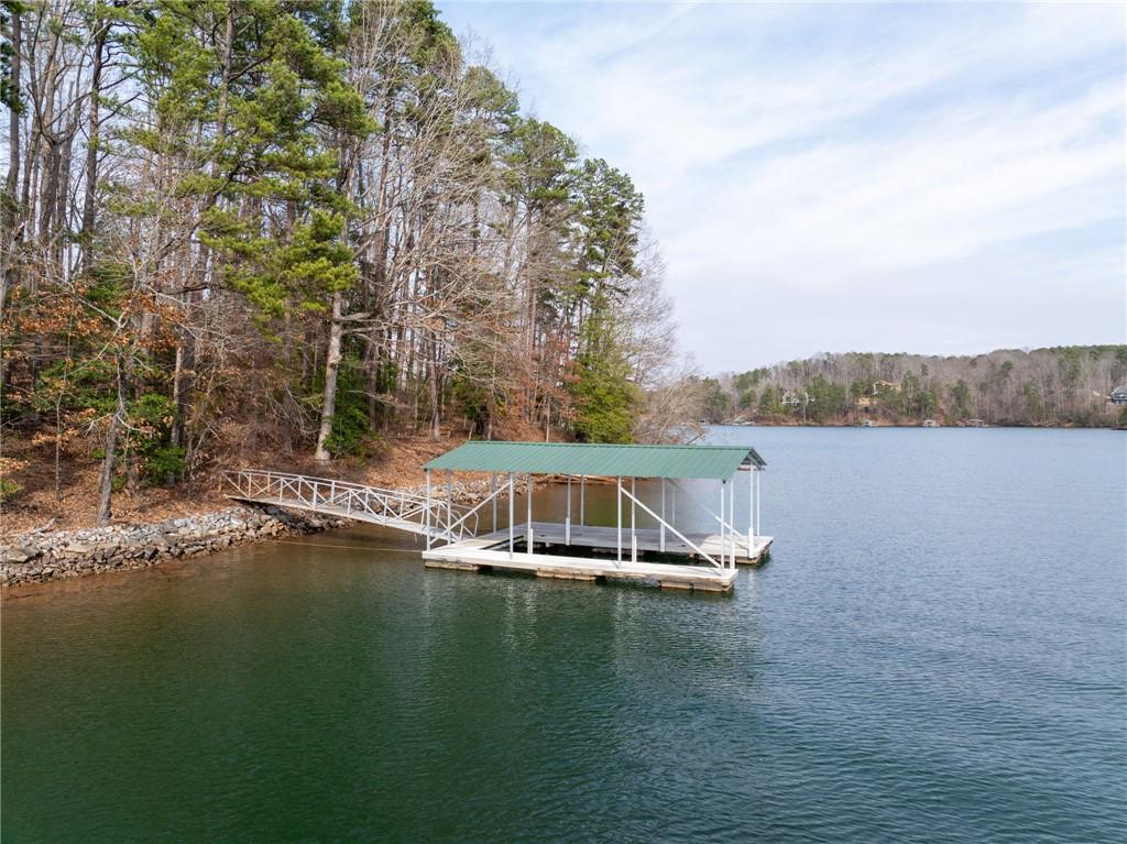 Image 2: This tranquil waterfront setting features a privat