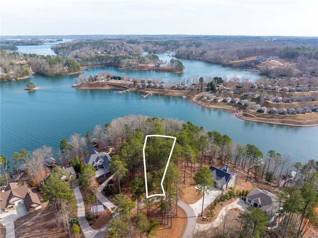 Image 4: This aerial view showcases a desirable waterfront