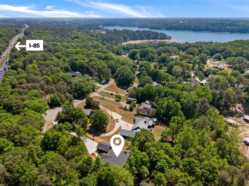 Image 3: An aerial view showcases a vibrant community nestl