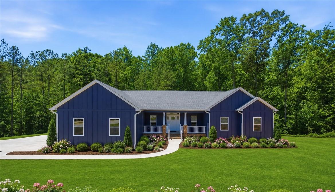 Image 2: Virtually Staged Landscaping of front of house! A
