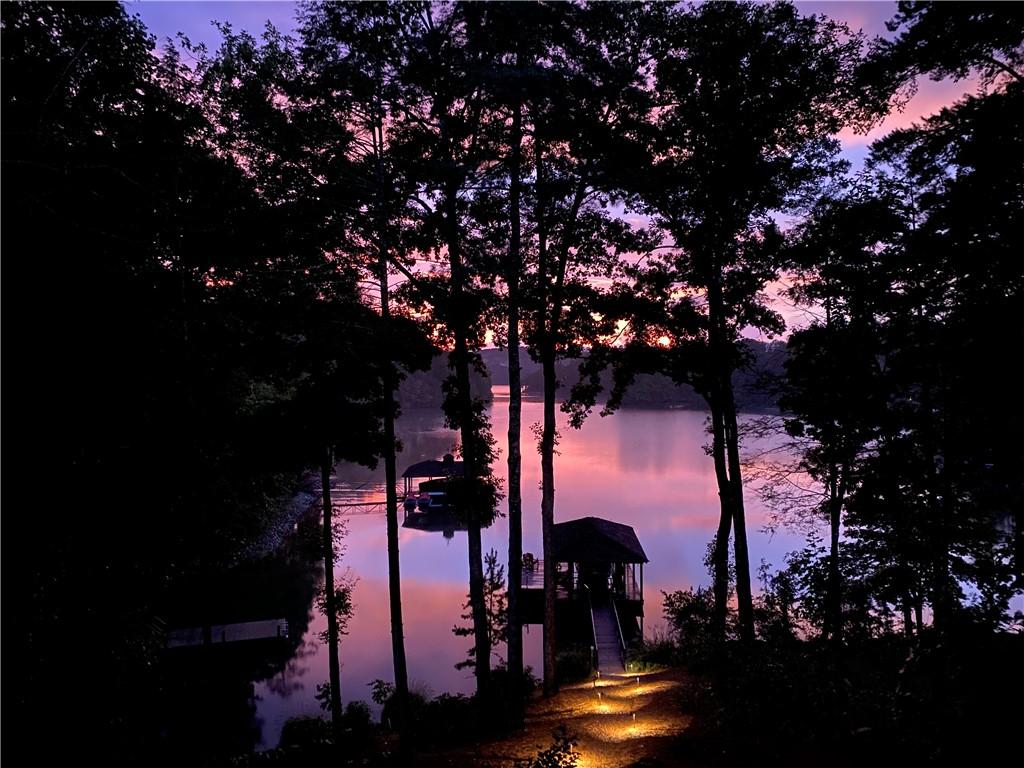 Image 4: Sunsets are all different! A tranquil lake view un