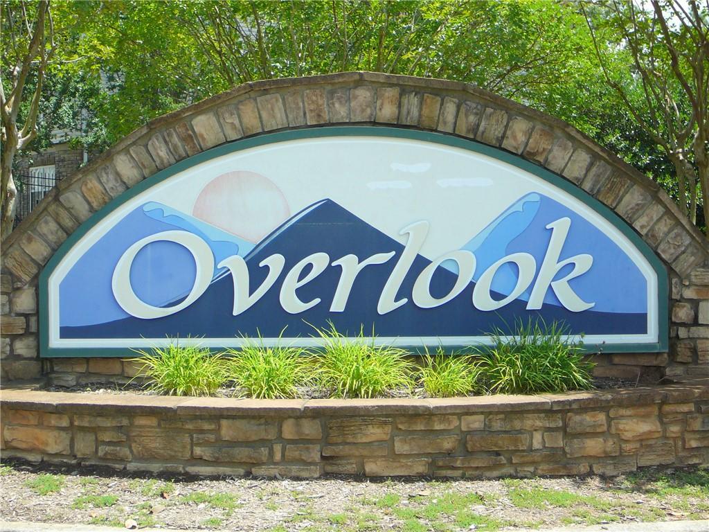 Image 2: A welcoming stone monument marks the community ent