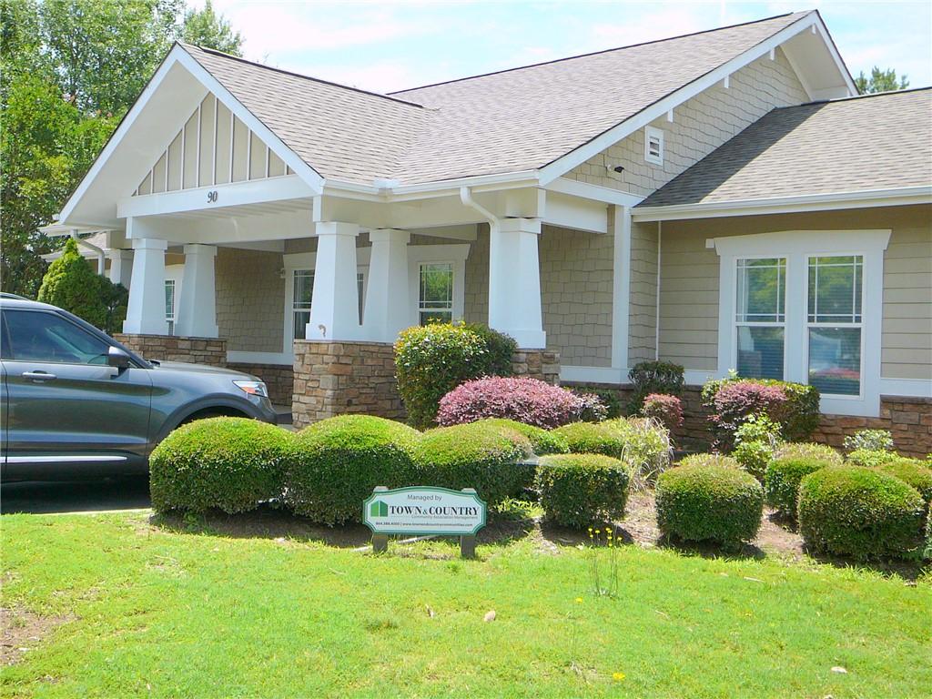 Image 3: A welcoming front exterior with well-maintained la