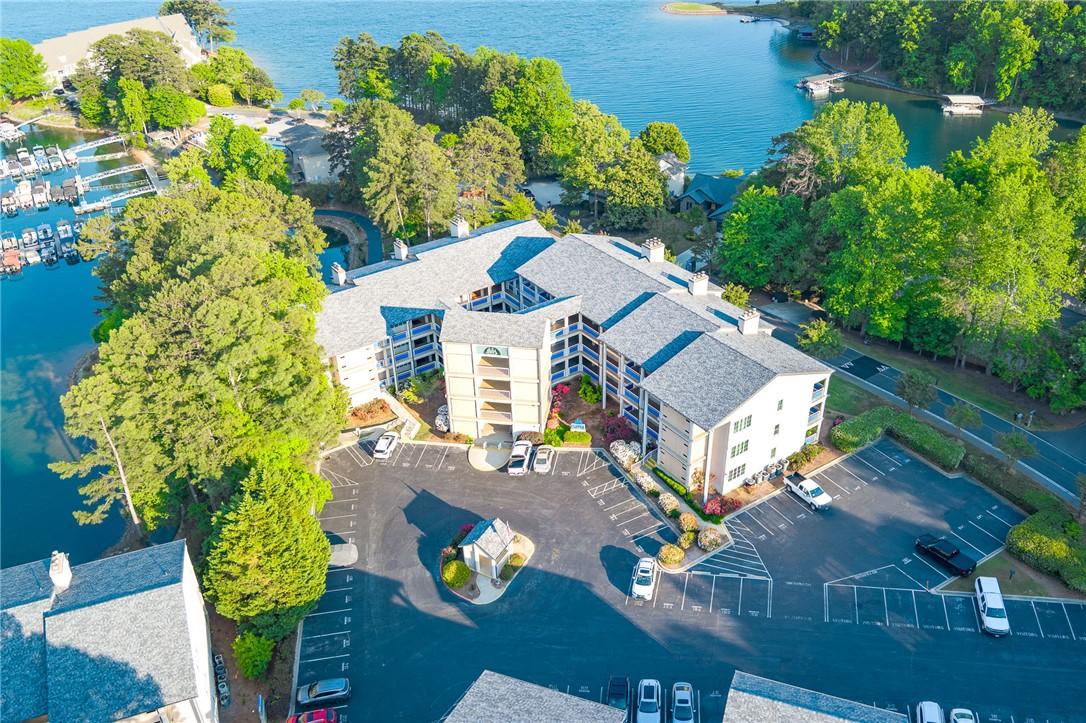 Image 2: This aerial view showcases a waterside multi-story