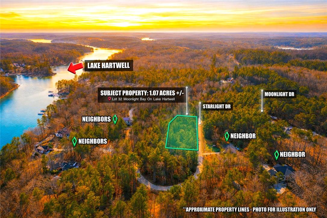 Image 1: This panoramic aerial view captures a serene lake,