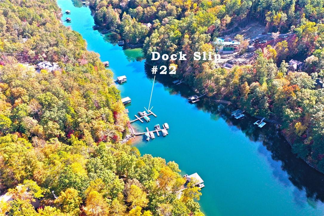 Image 4: This scenic waterfront property offers direct lake