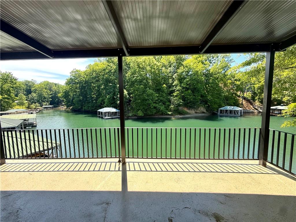 Image 2: Enjoy tranquil water views from this expansive pat