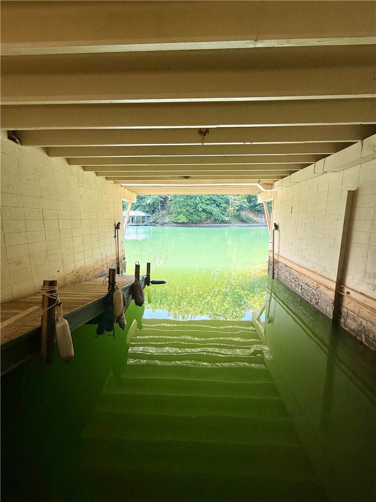 Image 4: This private boat slip offers direct access to the