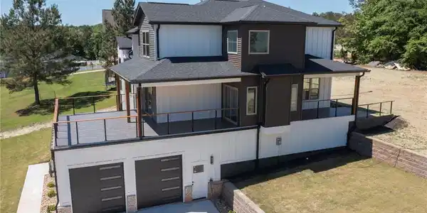 Image 3: This newly constructed residence showcases a seaml