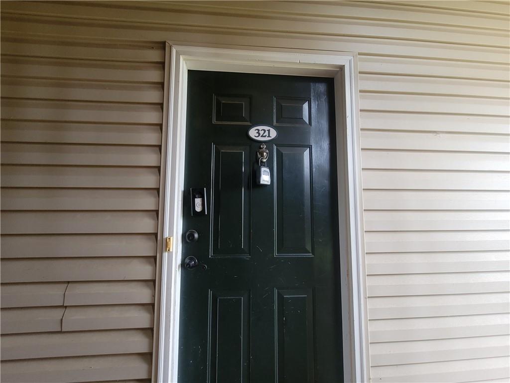 Image 3: Secure entry features a modern doorbell system and