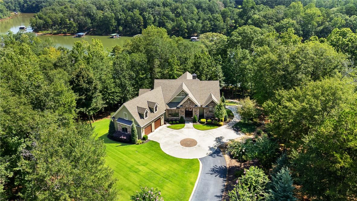 Image 3: This expansive estate features 2.2 acres of privac