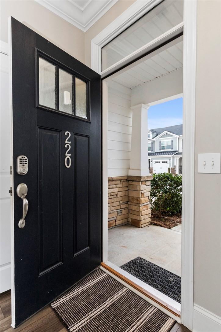 Image 2: Enter through this inviting doorway, revealing a w