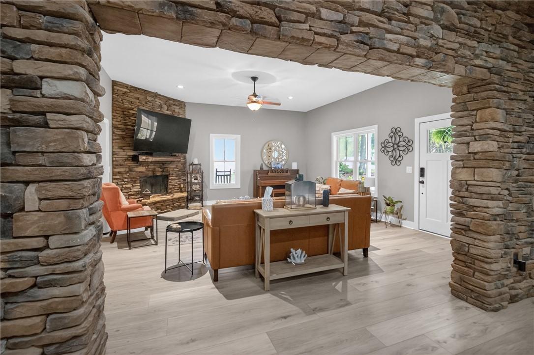 Image 4: This inviting living room showcases a beautiful st
