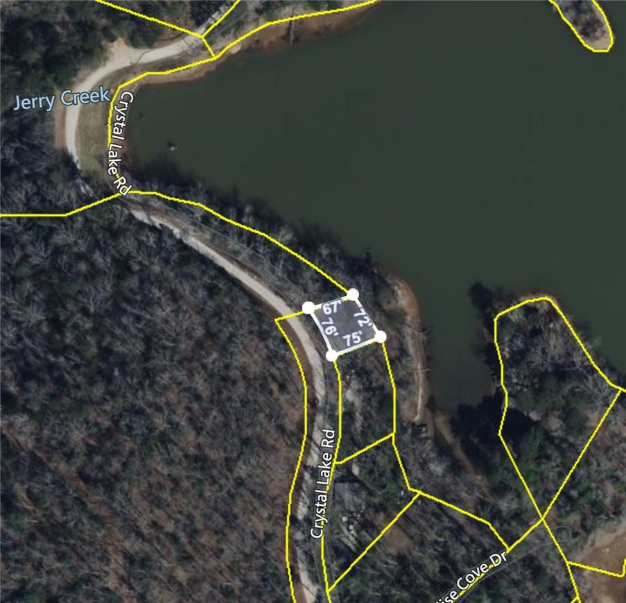 Image 2: A prime lakefront lot awaits, offering direct acce