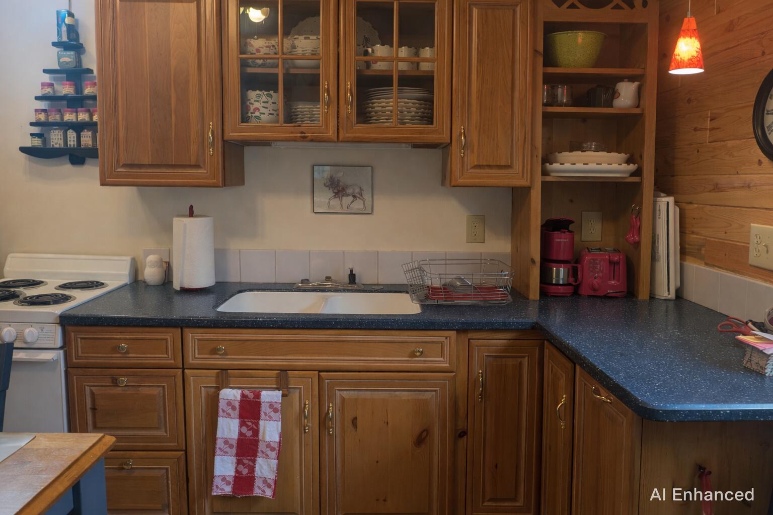 Image 3: Cozy kitchen corner with red accents - C