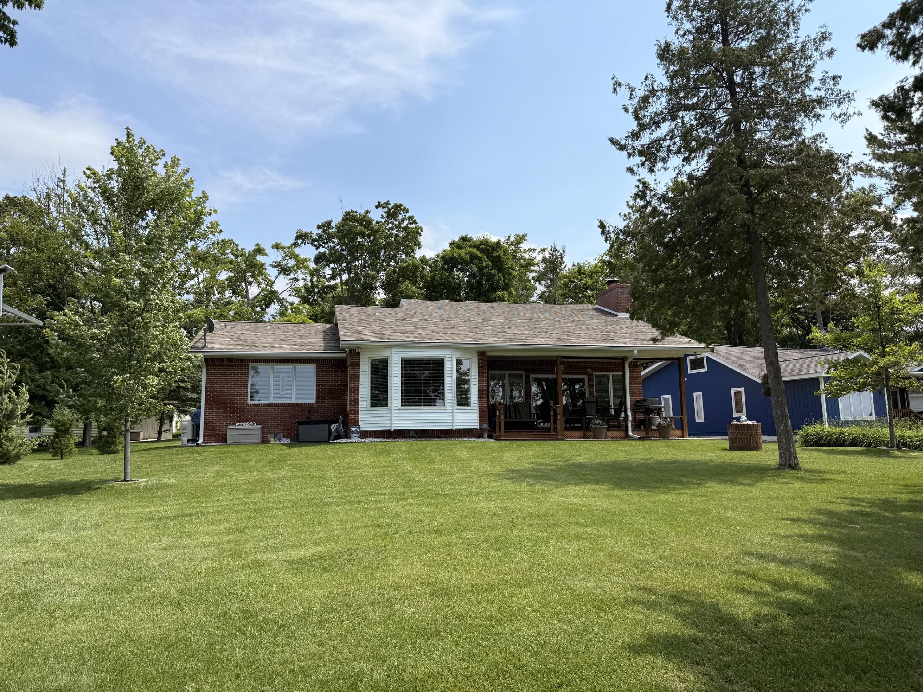 Image 2: lake side of home