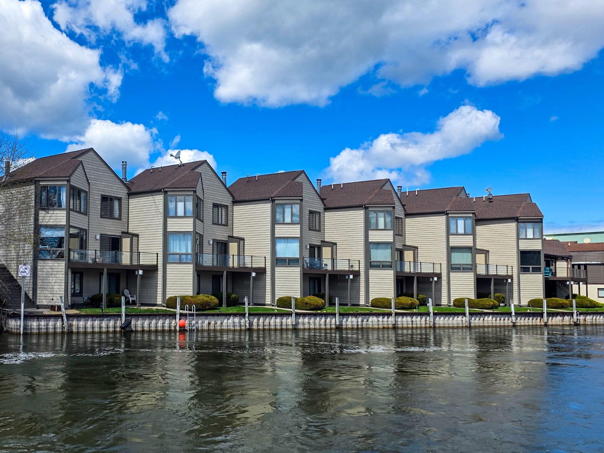 Image 1: 3rd Condo from the left